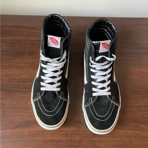 Vans Black and White High-Top Sneakers